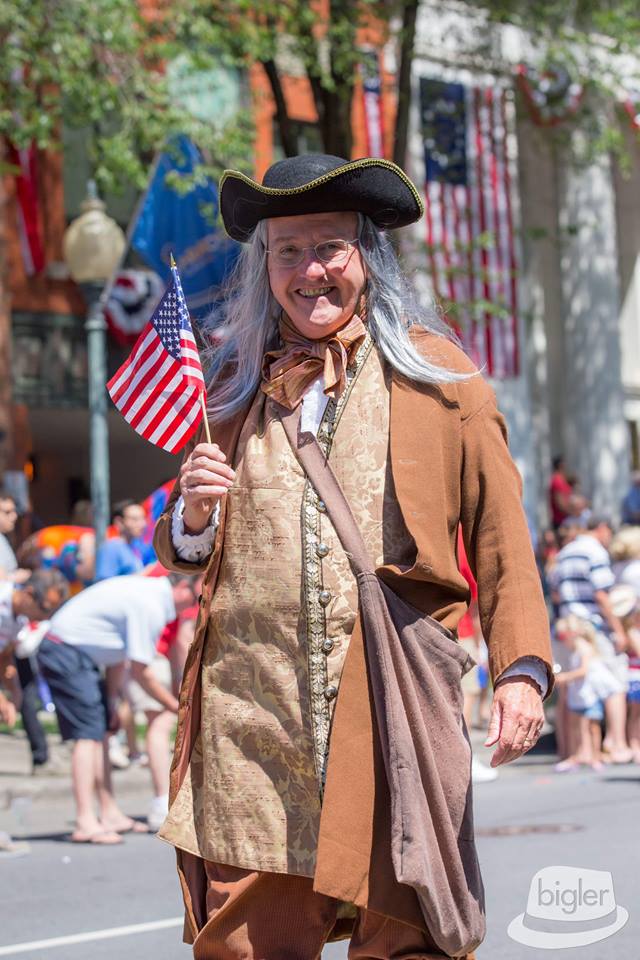 Image may contain: 1 person, standing, hat, beard and outdoor